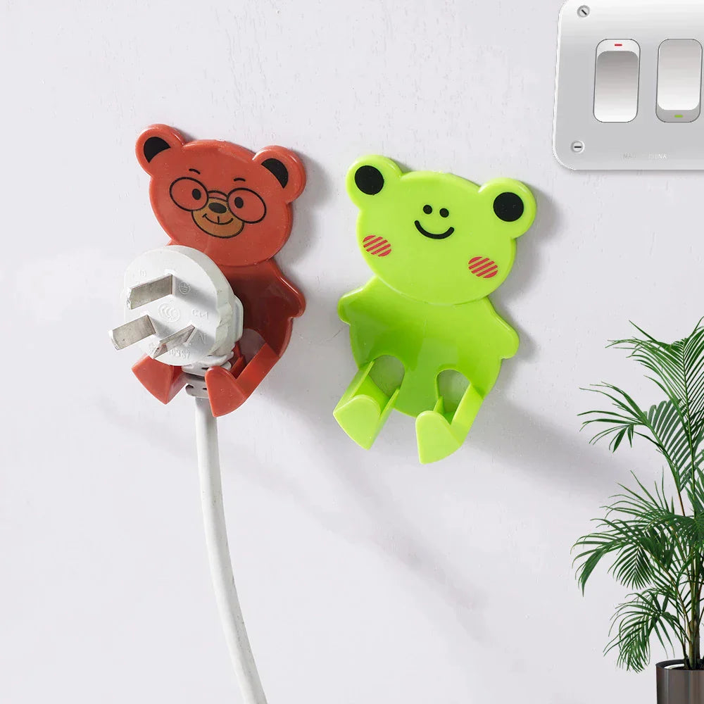 2Pcs Wall Adhesive Plastic Cartoon Power Plug Socket Holder Hook